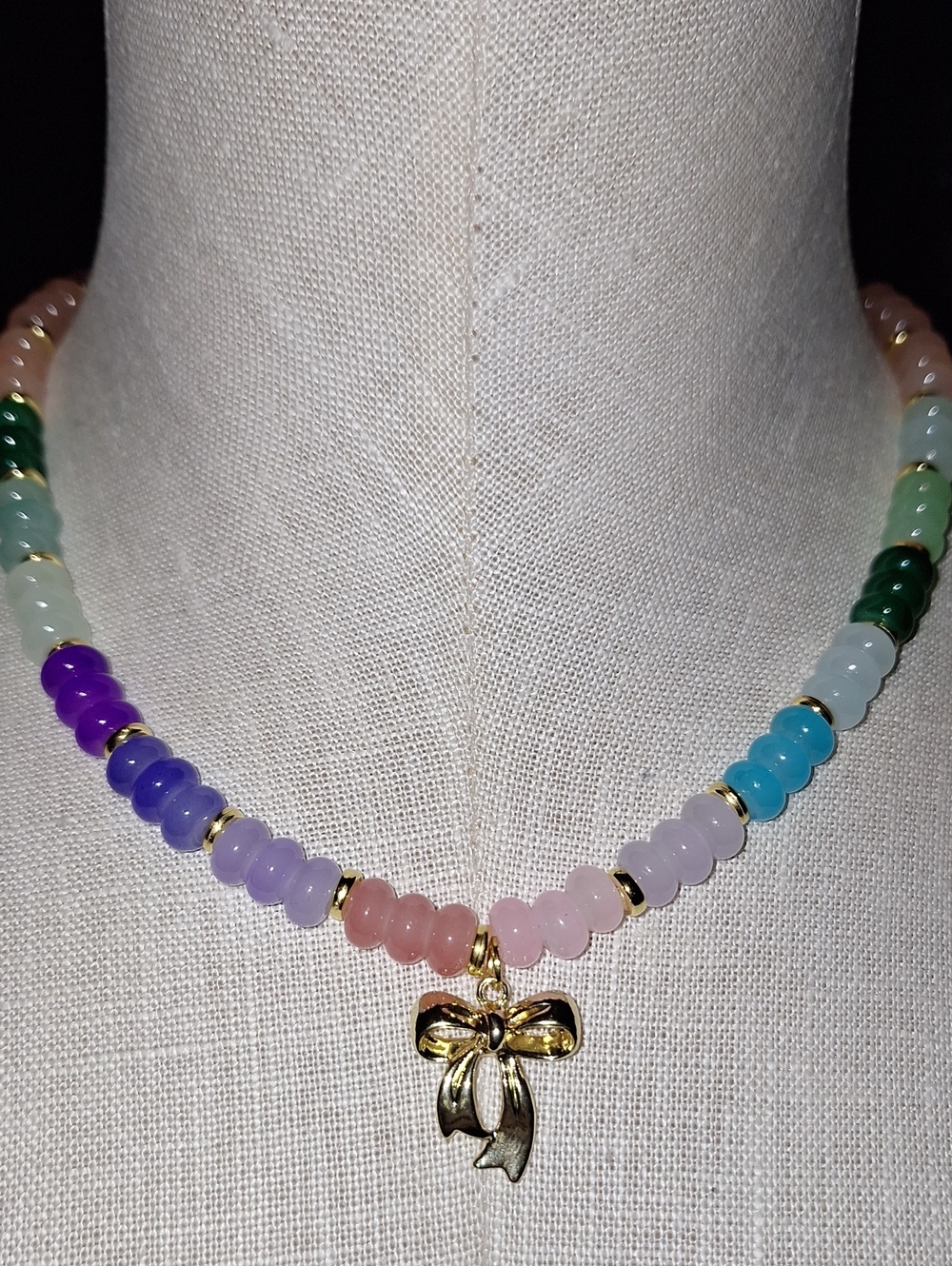 Multicolor Beaded Necklace with Gold Bow Pendant